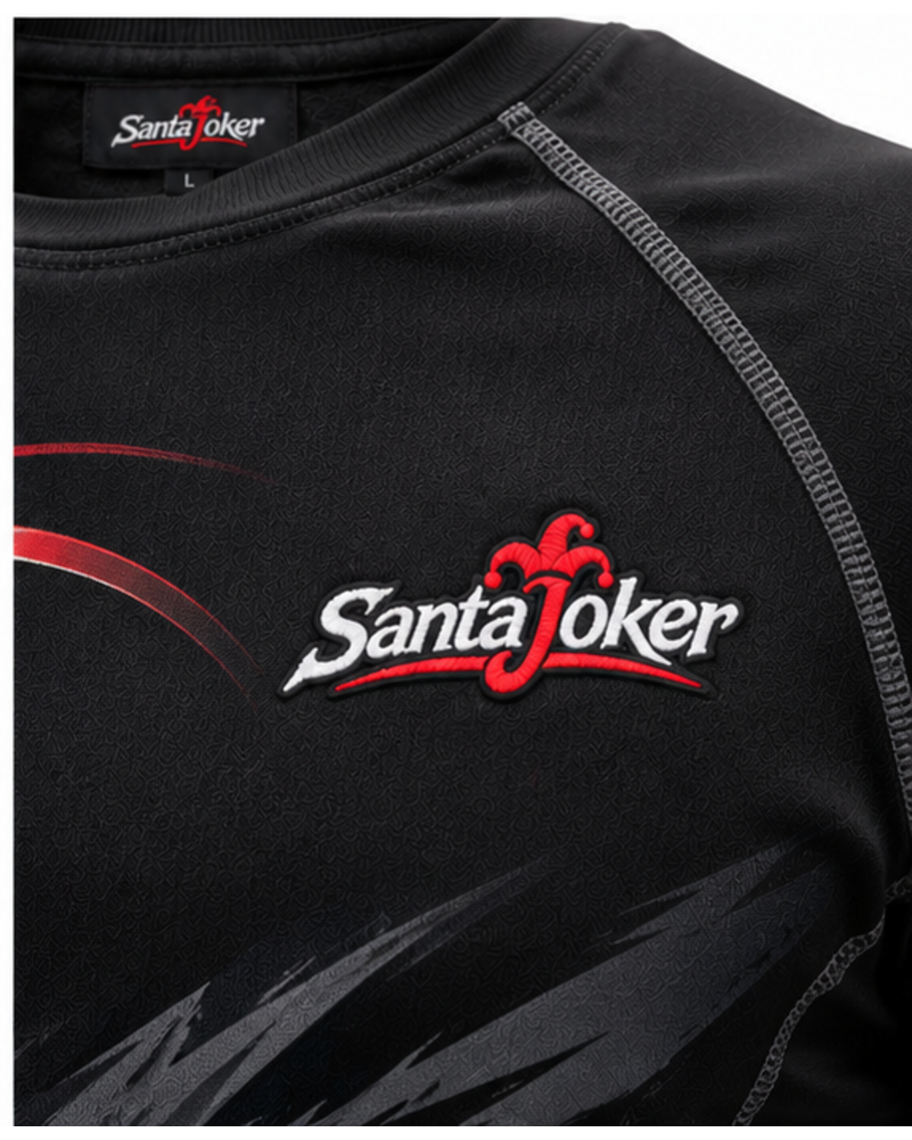 Matte Black men's compression rash guard, close-up of chest logo and flatlock raglan seam