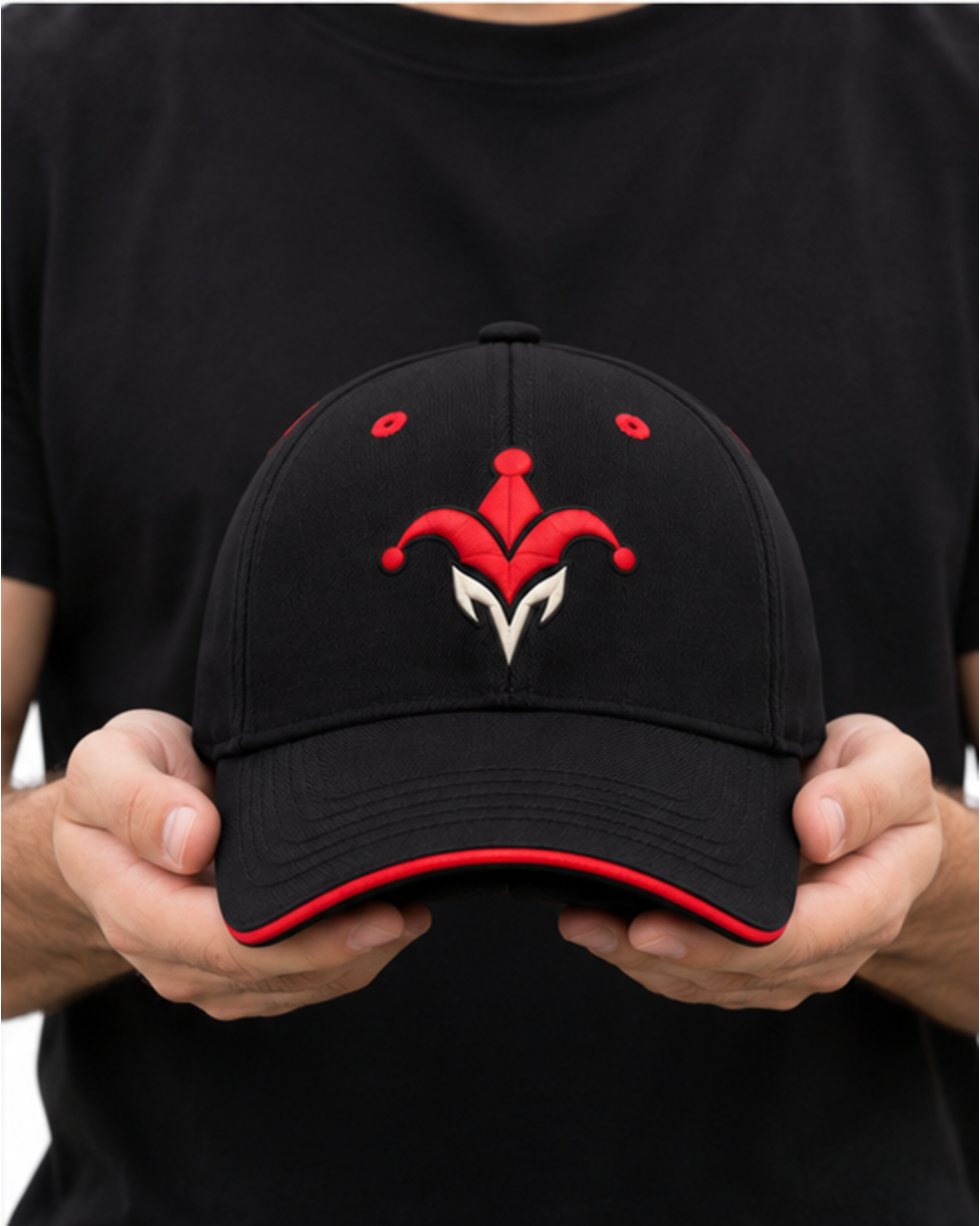 Matte Black unisex baseball cap, held in both hands